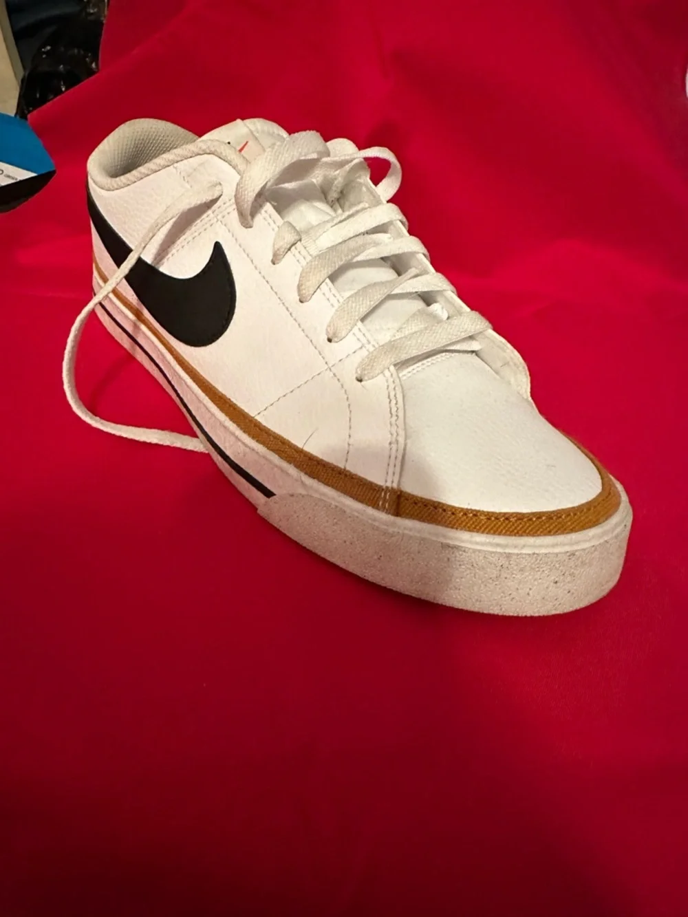 Nike White Sneakers with Navy Swoosh and Gold Accent - Picture 2 of 11